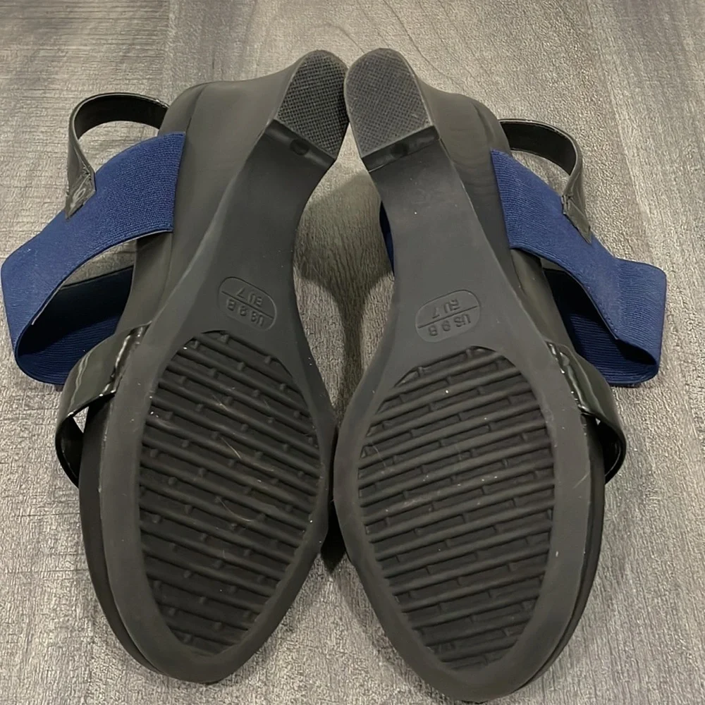 The Flexx blue & black give a lot wedge sandals size 9